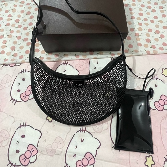 Alaia Handbags - Alaïa Black Mesh Crescent Shoulder Bag with Glossy Pouch